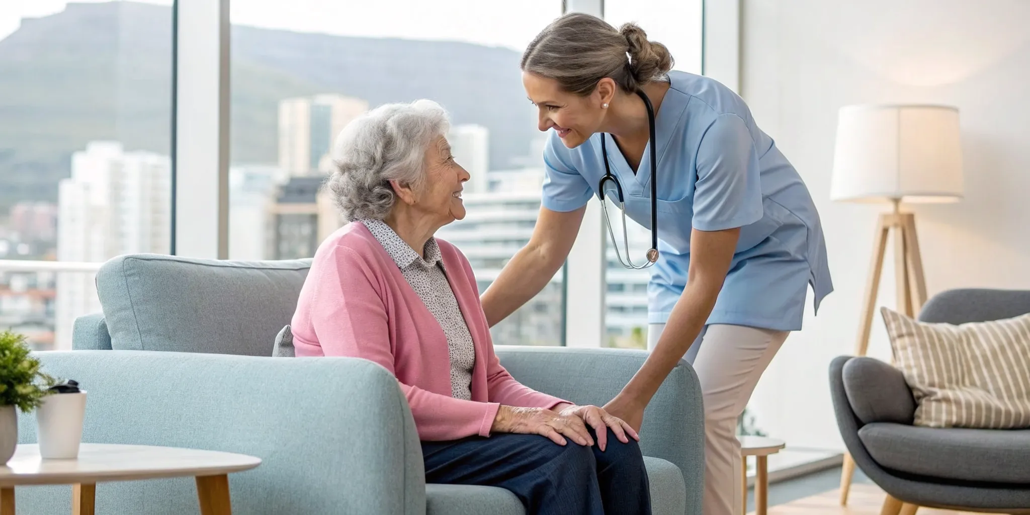 Geriatric therapist and a senior woman smiling during a therapy session in a California home.