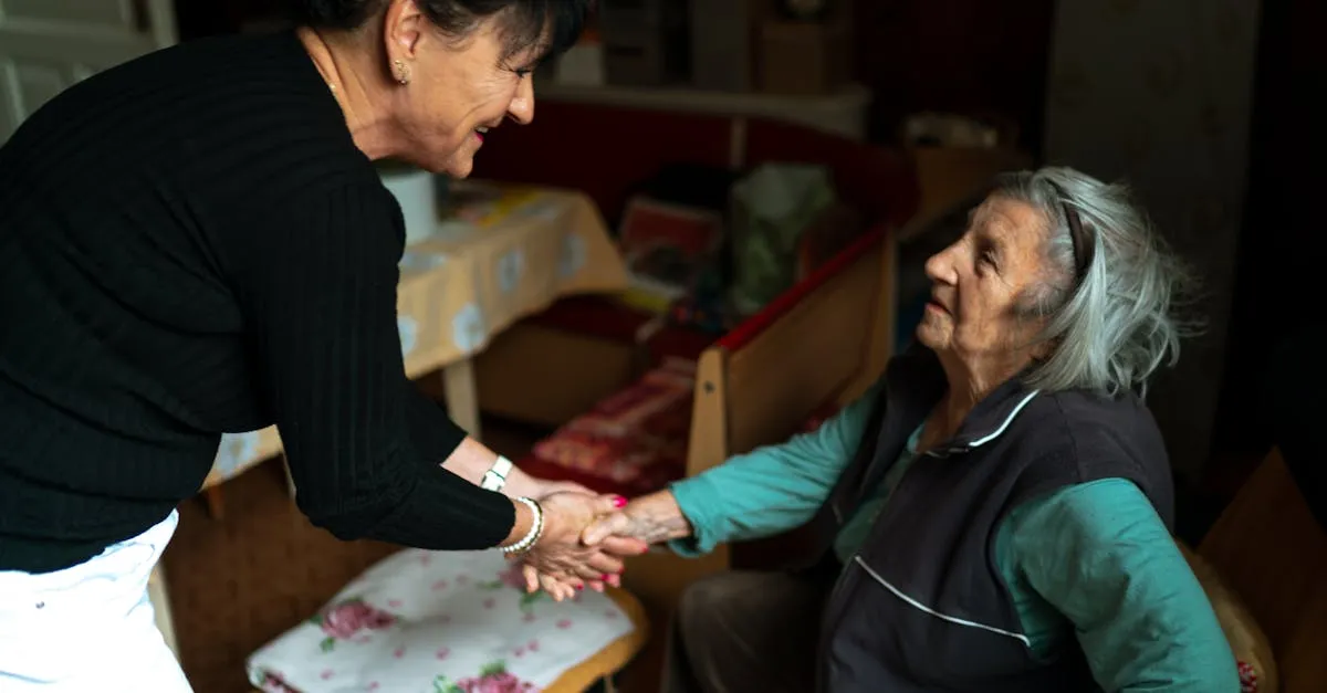 Family caregiver supporting an elderly woman at home during the aging process